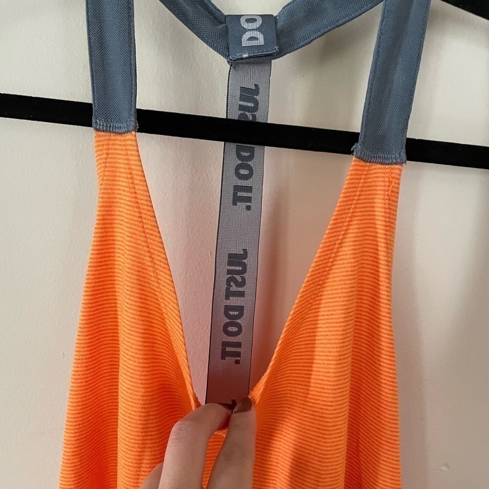 Nike Neon Orange Racerback Tank Top Women Medium
Condition 7/10 no flaws - Picture 6 of 8